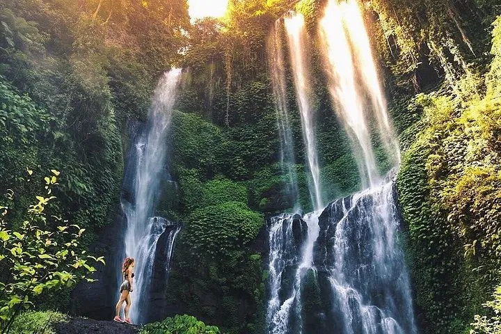 Sekumpul waterfall's cascades in the jungle valley on a guided Sekumpul trekking tour in North Bali